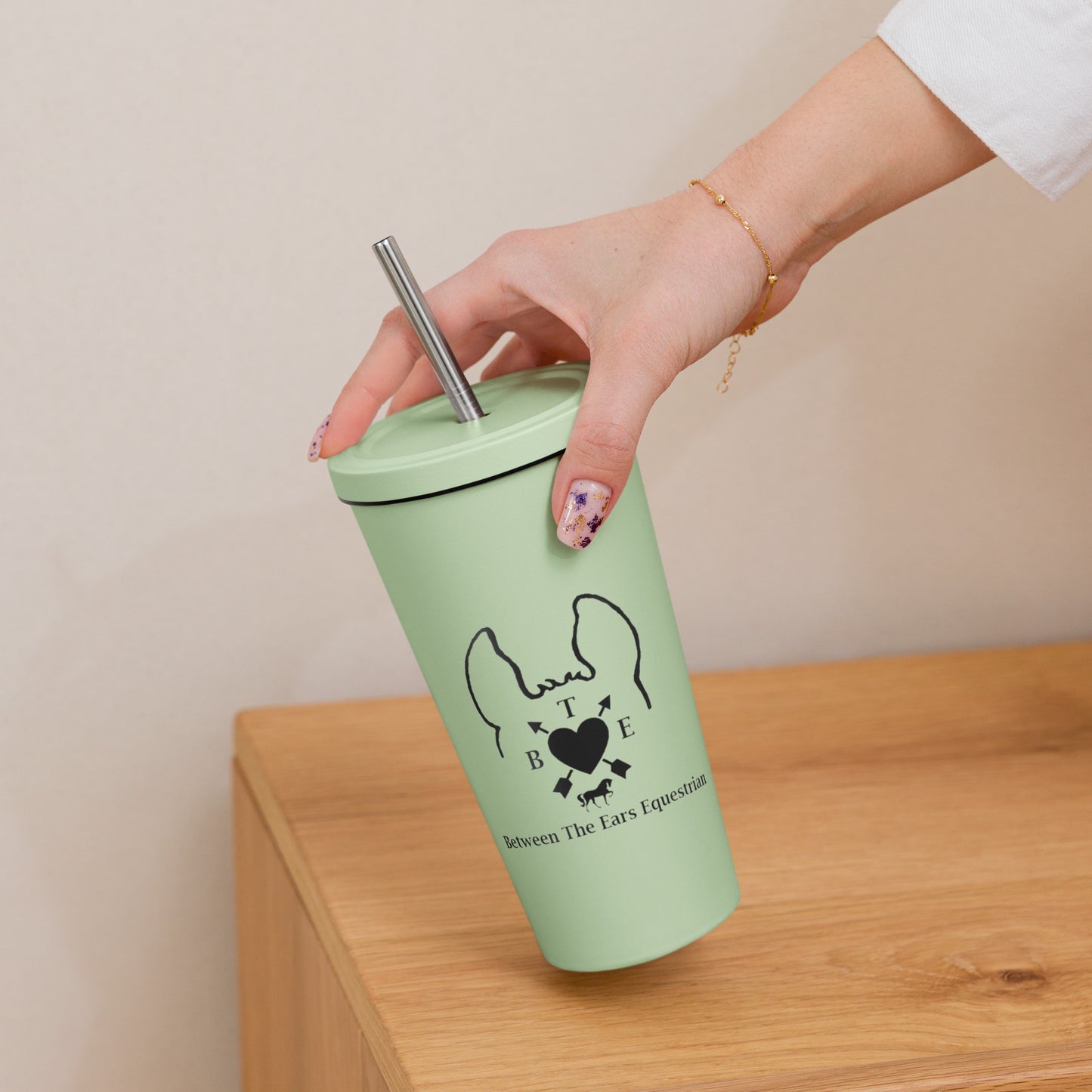 Insulated tumbler with a straw